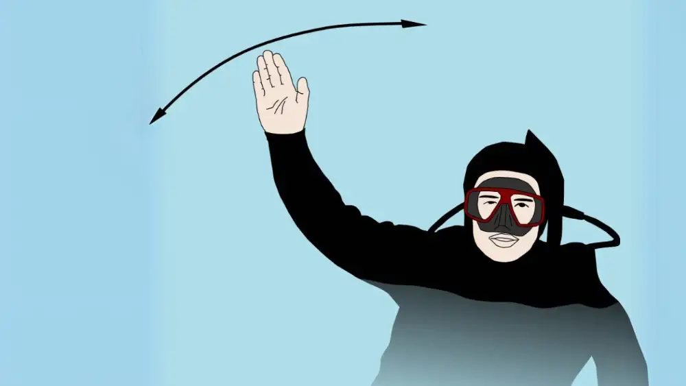 A diver waving an arm overhead to signal for help