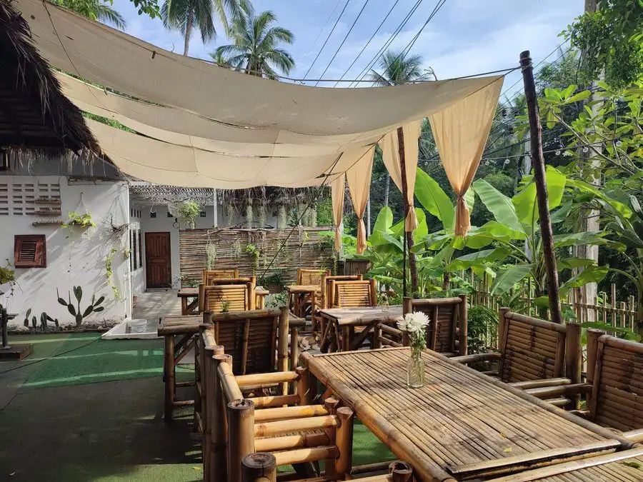 A burger with fries served at Blacktip Cafe, Koh Tao