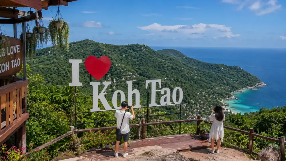 Love Koh Tao viewpoint: the I Love Koh Tao sign overlooking the jungle-covered east coast and Tanote Bay