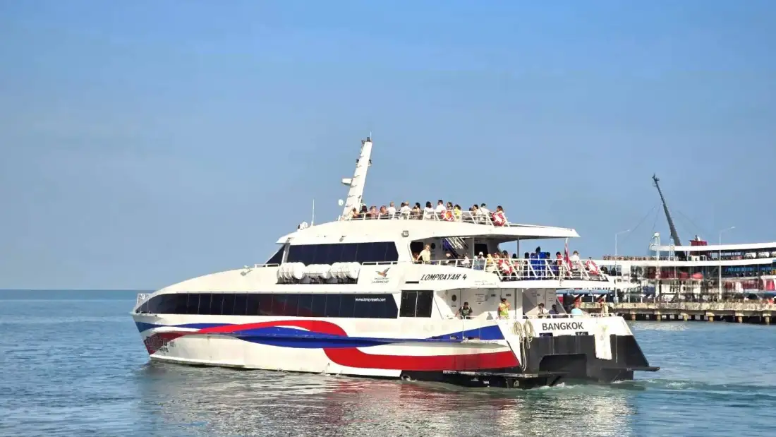 Passengers boarding a high-speed ferry at the pier for the transfer from Krabi to Koh Tao