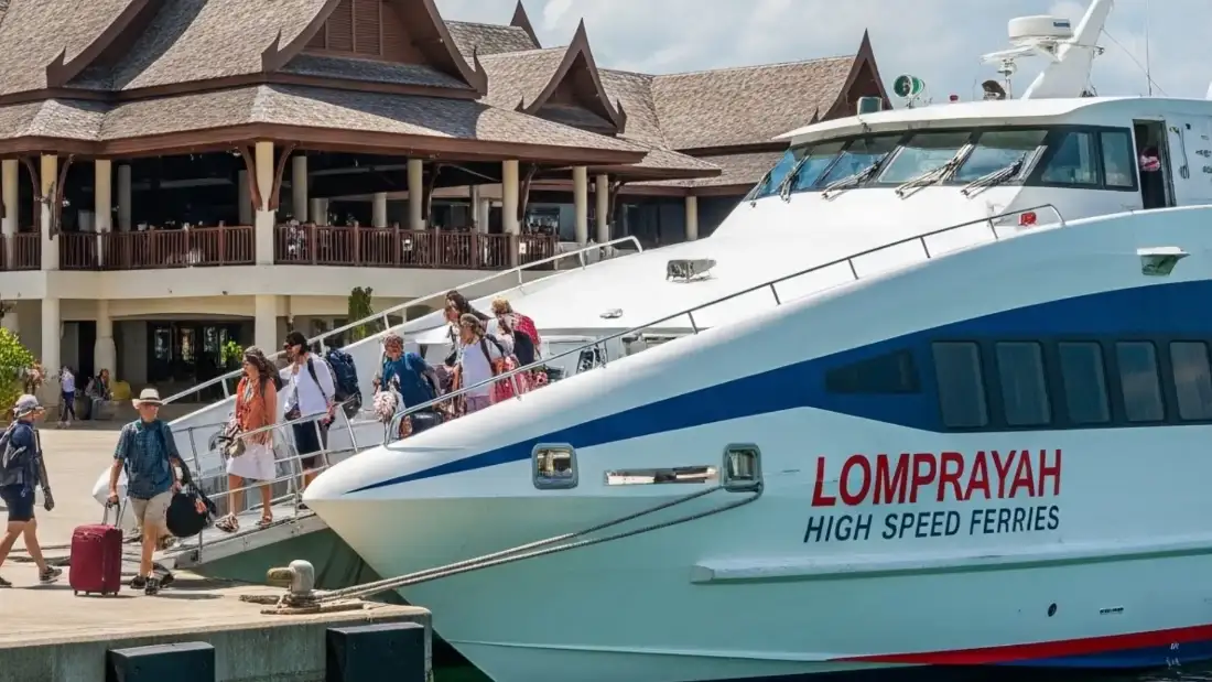 A Lomprayah high-speed catamaran ferry approaching Koh Tao on the crossing from Koh Samui