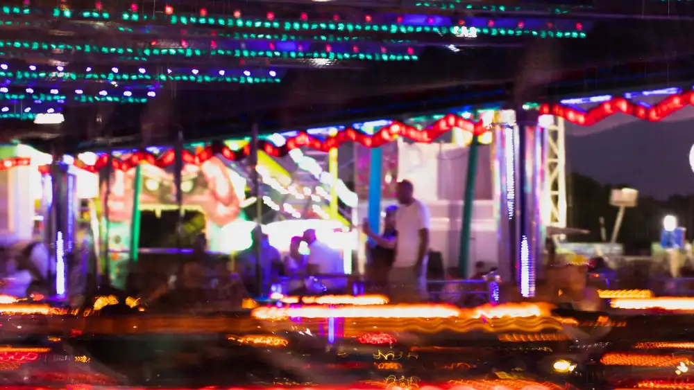 Beach bars lit up at sunset on Sairee Beach, Koh Tao's main nightlife area