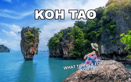 A packed travel bag with swimwear, sandals, sunscreen and a snorkel mask laid out for a Koh Tao trip
